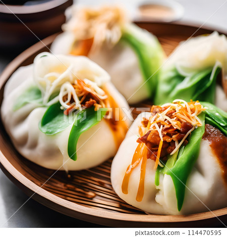 Homemade Delicious bao buns with vegetable. Steamed buns with pork belly and vegetable. Asian cuisine 114470595