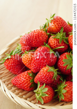 Strawberries in a colander 114472315