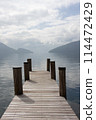 Wooden pier on the lake 114472429