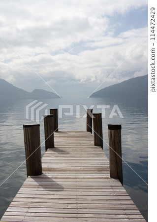 Wooden pier on the lake Wooden pier on the lake 114472429