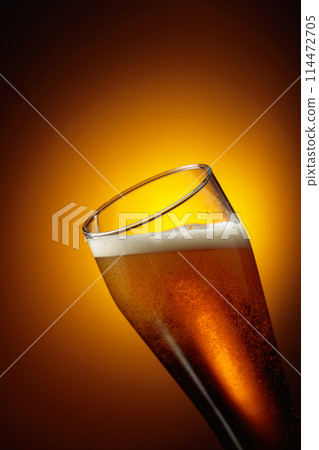 Beer in a tall glass. Beer in a tall glass. 114472705