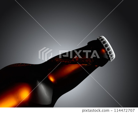 Close-up of an unopened beer bottle. 114472707