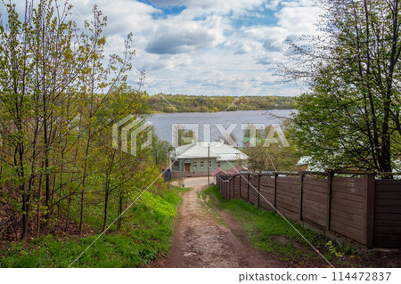 Beautiful rural wooden house on the slope by the river Beautiful rural wooden house on the slope by the river 114472837