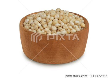 Sorghum seeds in wooden bowl isolated on white background with full depth of field. 114472983