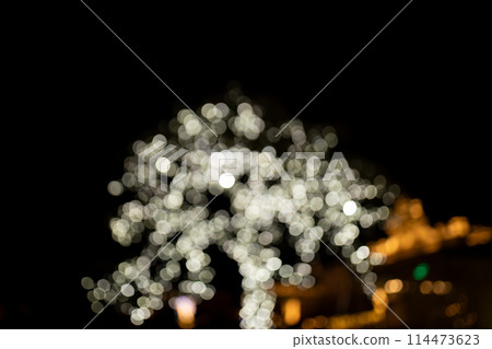 Decorative outdoor string lights at night time, Defocused Background, night city life backdrop, party time with Yellow bokeh balls Decorative outdoor string lights at night time, Defocused Background, night city life backdrop, party time with Yellow bokeh balls 114473623