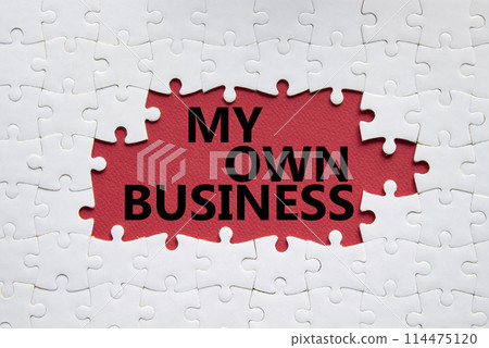 My own Business symbol. Concept words My own Business on white puzzle. Beautiful red background Business and My own Business concept. Copy space. 114475120
