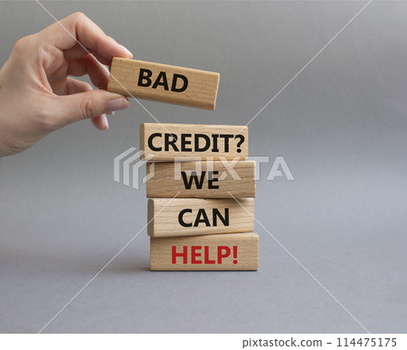 Bad credit We can Help symbol. Wooden blocks with words Bad credit We can Help. Beautiful grey background. Businessman hand. Business and Bad credit We can Help concept. Copy space. Bad credit We can Help symbol. Wooden blocks with words Bad credit We can Help. Beautiful grey background. Businessman hand. Business and Bad credit We can Help concept. Copy space. 114475175