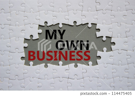 My own Business symbol. Concept words My own Business on white puzzle. Beautiful grey background Business and My own Business concept. Copy space. My own Business symbol. Concept words My own Business on white puzzle. Beautiful grey background Business and My own Business concept. Copy space. 114475405