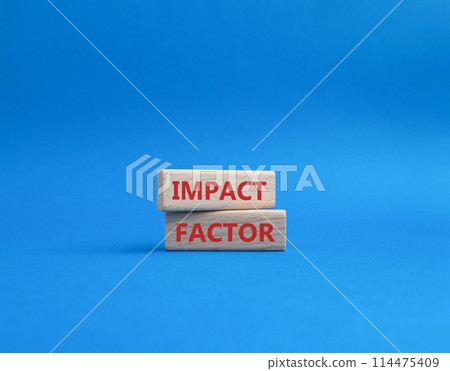 Impact Factor symbol. Wooden blocks with words Impact Factor. Beautiful blue background. Business and Impact Factor concept. Copy space. 114475409