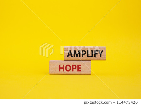 Amplify Hope symbol. Wooden blocks with words Amplify Hope. Beautiful yellow background. Business and Amplify Hope concept. Copy space. Amplify Hope symbol. Wooden blocks with words Amplify Hope. Beautiful yellow background. Business and Amplify Hope concept. Copy space. 114475420