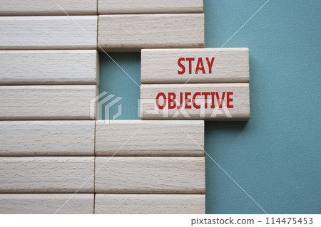 Stay Objective symbol. Wooden blocks with words Stay Objective. Beautiful green background. Business and Stay Objective concept. Copy space. Stay Objective symbol. Wooden blocks with words Stay Objective. Beautiful green background. Business and Stay Objective concept. Copy space. 114475453