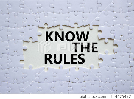 Know the rules symbol. Concept words Know the rules on white puzzle. Beautiful white background. Business and Know the rules concept. Copy space. Know the rules symbol. Concept words Know the rules on white puzzle. Beautiful white background. Business and Know the rules concept. Copy space. 114475457