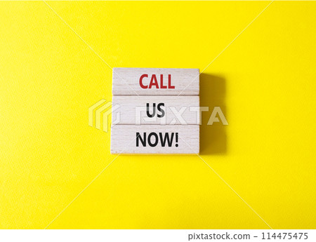 Call us now symbol. Wooden blocks with words Call us now. Beautiful yellow background. Business and Call us now concept. Copy space. Call us now symbol. Wooden blocks with words Call us now. Beautiful yellow background. Business and Call us now concept. Copy space. 114475475