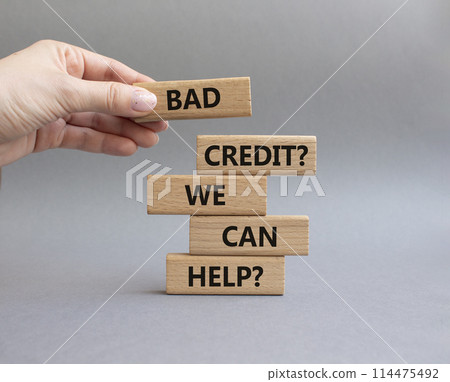 Bad credit We can Help symbol. Wooden blocks with words Bad credit We can Help. Beautiful grey background. Businessman hand. Business and Bad credit We can Help concept. Copy space. Bad credit We can Help symbol. Wooden blocks with words Bad credit We can Help. Beautiful grey background. Businessman hand. Business and Bad credit We can Help concept. Copy space. 114475492