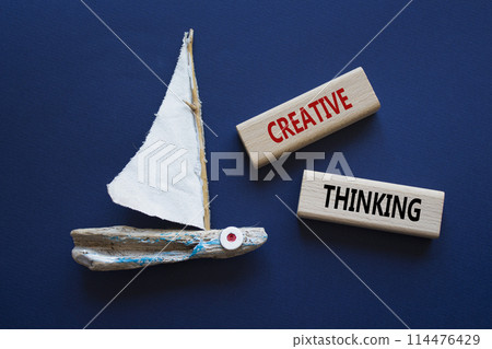 Creative thinking symbol. Wooden blocks with words Creative thinking. Beautiful deep blue background with boat. Business and Creative thinking concept. Copy space. Creative thinking symbol. Wooden blocks with words Creative thinking. Beautiful deep blue background with boat. Business and Creative thinking concept. Copy space. 114476429