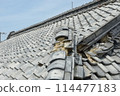 Collapsing roof of an old house 114477183