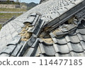 Collapsing roof of an old house 114477185