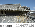 Collapsing roof of an old house 114477189