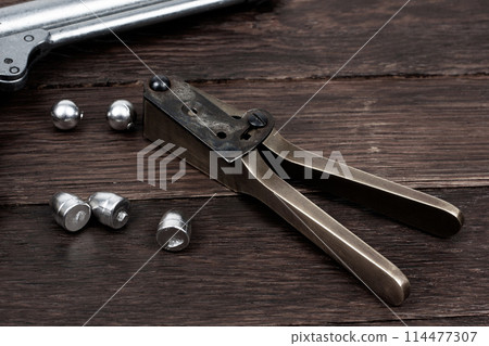 old west bullet mold with bullets for revolver. 114477307