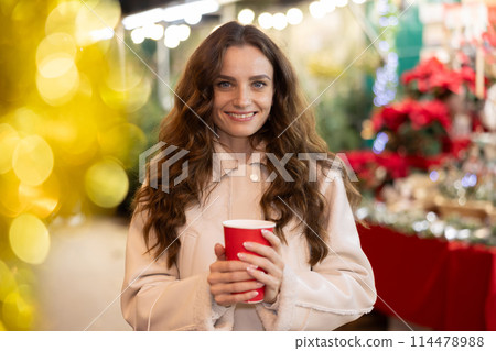 Woman at Christmas market Woman at Christmas market 114478988