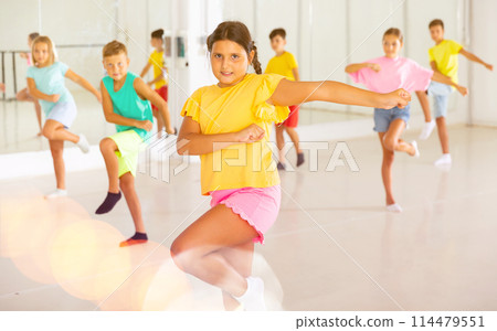 Dance studio - girls and boys in dance lesson 114479551