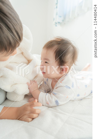 Waking up, nap, baby, brothers, good friends 114480414