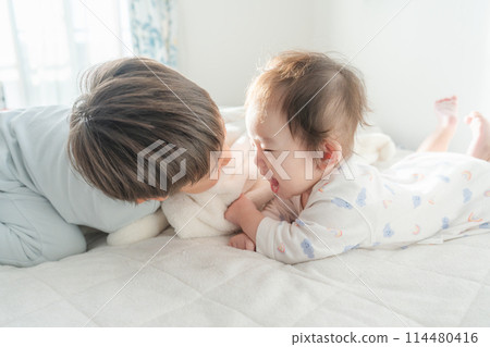 Waking up, nap, baby, brothers, good friends 114480416