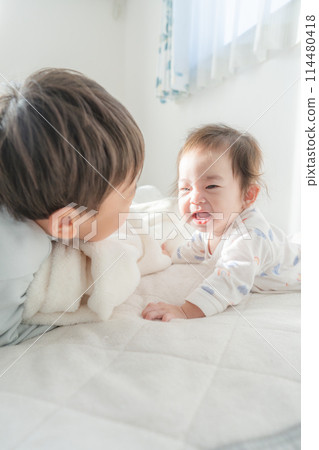 Waking up, nap, baby, brothers, good friends Waking up, nap, baby, brothers, good friends 114480418