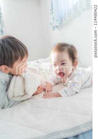 Waking up, nap, baby, brothers, good friends Waking up, nap, baby, brothers, good friends 114480422