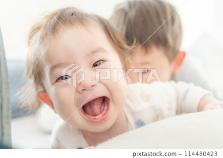 Waking up, nap, baby, brothers, good friends 114480423