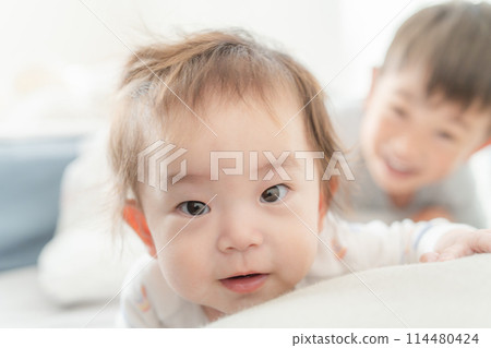 Waking up, nap, baby, brothers, good friends 114480424