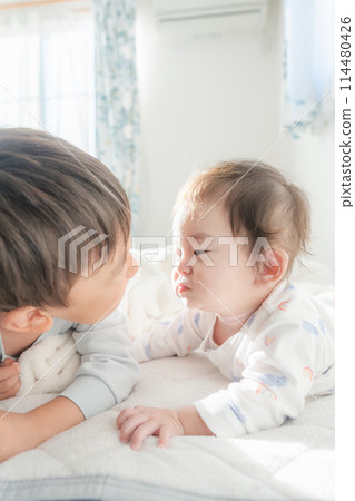 Waking up, nap, baby, brothers, good friends Waking up, nap, baby, brothers, good friends 114480426