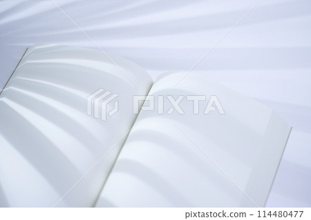 Bright background material of notebooks by the window Bright background material of notebooks by the window 114480477