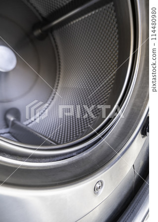 Interior detail of industrial washing machine, hygiene and cleaning Interior detail of industrial washing machine, hygiene and cleaning 114480980