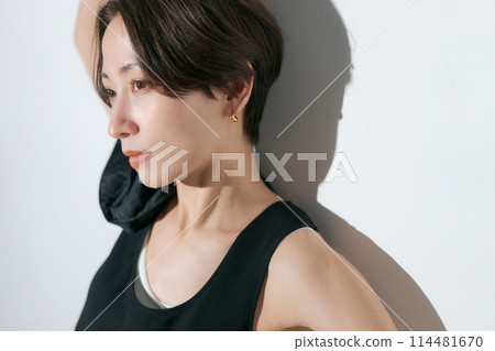 Woman in tank top Woman in tank top 114481670