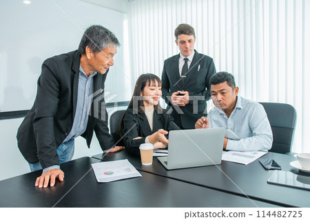 Business people  team work while working in board room, design project, discussing ideas,discuss financial statistics together teamwork concept 114482725
