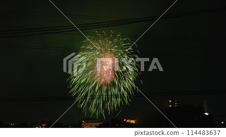 Gorgeous fireworks and power lines lighting up the city's night sky Gorgeous fireworks and power lines lighting up the city's night sky 114483637