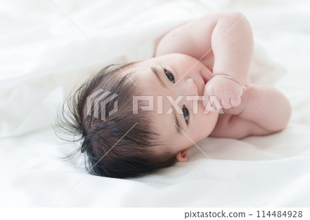 A naked baby A naked baby 114484928