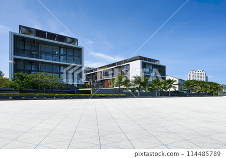Modern office building exterior with blue sky 114485789