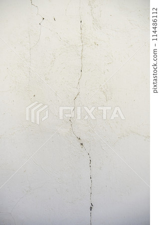 Detail of cladding and decoration on a wall outside 114486112