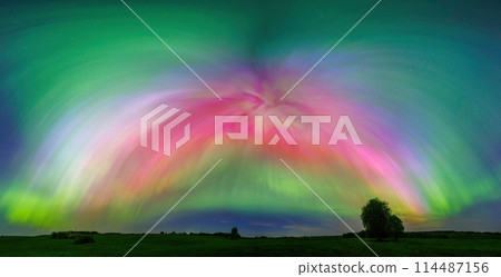 Aurora borealis is a natural light show in the sky resembling a rainbow 114487156