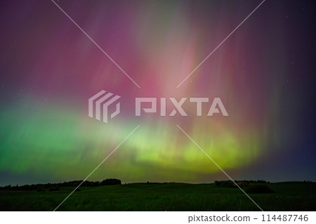 Aurora borealis is a natural light show in the sky resembling a rainbow 114487746