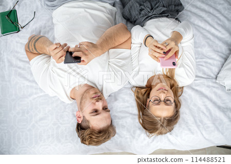 gadgets influence on people , bedtime with phones. 114488521