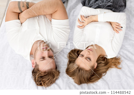 pensive serious couple trying to solve problems pensive serious couple trying to solve problems 114488542