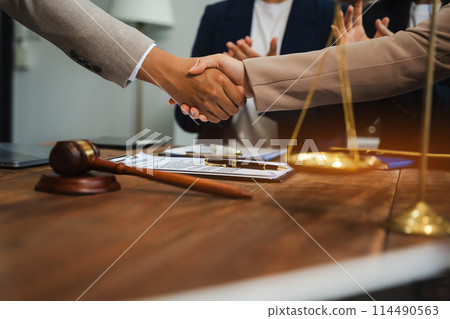 Successful Lawyer victory shaking hands thumbs to show success and motivation. 114490563