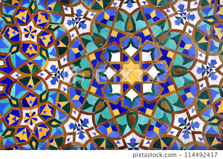 Vertical or horizontal background with detail of ancient mosaic walls with floral and geometric ornaments. Traditional moroccan tile decorations Vertical or horizontal background with detail of ancient mosaic walls with floral and geometric ornaments. Traditional moroccan tile decorations 114492417