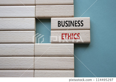 Business ethics symbol. Concept word Business ethics on wooden blocks. Beautiful grey green background. Business and Business ethics concept. Copy space 114495297
