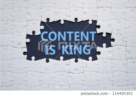Content is king symbol. Concept words Content is king on white puzzle. Beautiful deep blue background. Business and Content is king concept. Copy space. Content is king symbol. Concept words Content is king on white puzzle. Beautiful deep blue background. Business and Content is king concept. Copy space. 114495301