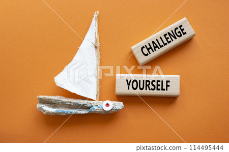 Challenge yourself symbol. Wooden blocks with words Challenge yourself. Beautiful orange background with boat. Business and Challenge yourself concept. Copy space. Challenge yourself symbol. Wooden blocks with words Challenge yourself. Beautiful orange background with boat. Business and Challenge yourself concept. Copy space. 114495444