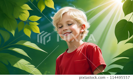 smiling boy with a green background with the sun shining through the leaves 114495557
